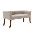 Banc rembourré en tissu avec garniture cloutée et pieds évasés en bois d'hévéa